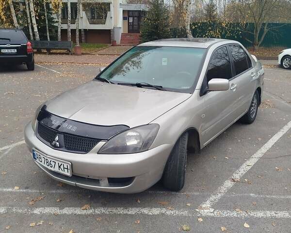 Сірий Міцубісі Lancer, об'ємом двигуна 2 л та пробігом 330 тис. км за 3450 $, фото 7 на Automoto.ua