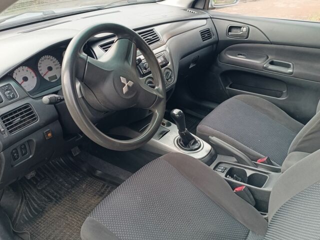 Сірий Міцубісі Lancer, об'ємом двигуна 1.6 л та пробігом 267 тис. км за 3600 $, фото 6 на Automoto.ua
