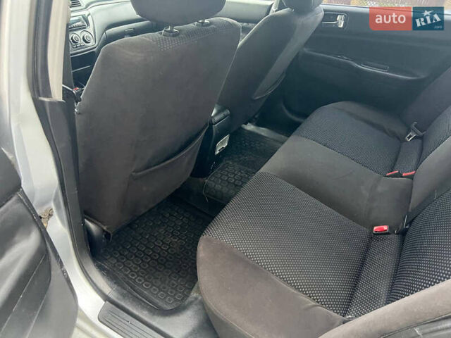Сірий Міцубісі Lancer, об'ємом двигуна 1.58 л та пробігом 333 тис. км за 2999 $, фото 13 на Automoto.ua