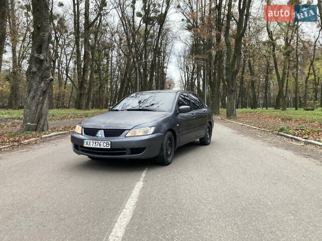 Сірий Міцубісі Lancer, об'ємом двигуна 1.6 л та пробігом 222 тис. км за 4900 $, фото 1 на Automoto.ua