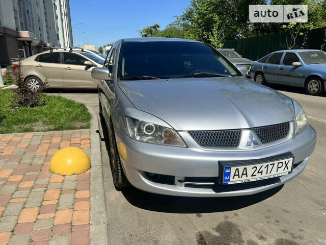 Сірий Міцубісі Lancer, об'ємом двигуна 1.58 л та пробігом 190 тис. км за 4900 $, фото 3 на Automoto.ua