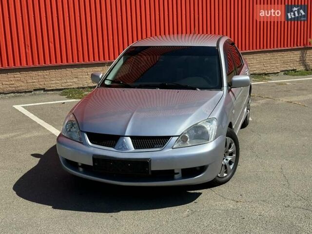 Серый Мицубиси Лансер, объемом двигателя 0 л и пробегом 182 тыс. км за 6500 $, фото 1 на Automoto.ua