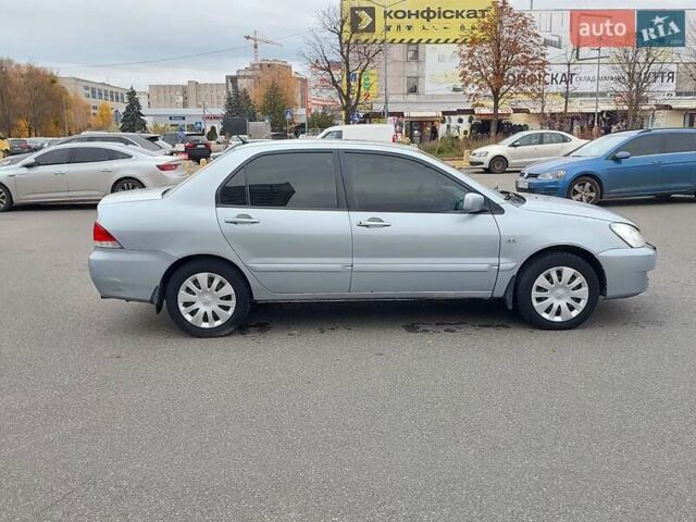 Мицубиси Лансер 2006 в Киеве на Automoto.ua Серый Мицубиси Лансер, объемом двигателя 1.6 л и пробегом 426 тыс. км за 3800 $, фото 8 на Automoto.ua