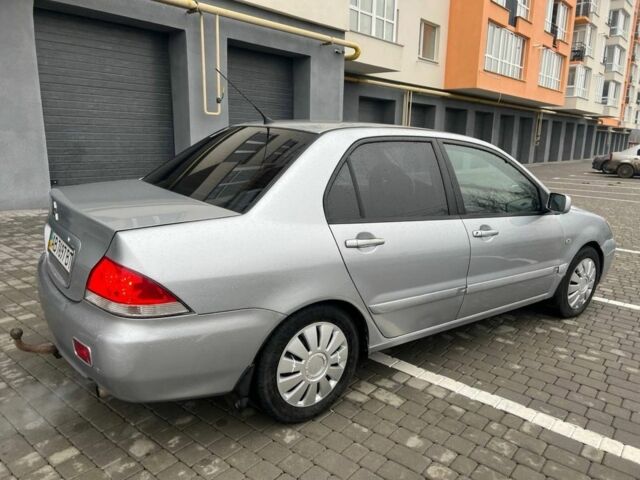 Серый Мицубиси Лансер, объемом двигателя 1.6 л и пробегом 333 тыс. км за 2800 $, фото 8 на Automoto.ua