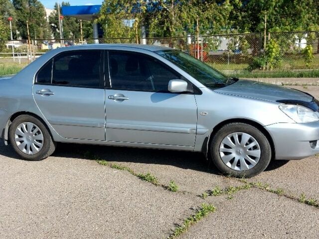 Сірий Міцубісі Lancer, об'ємом двигуна 0 л та пробігом 159 тис. км за 4500 $, фото 11 на Automoto.ua