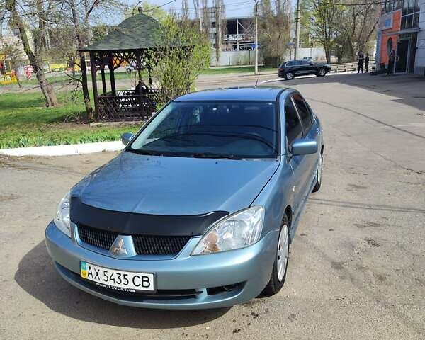 Сірий Міцубісі Lancer, об'ємом двигуна 1.6 л та пробігом 212 тис. км за 4700 $, фото 14 на Automoto.ua