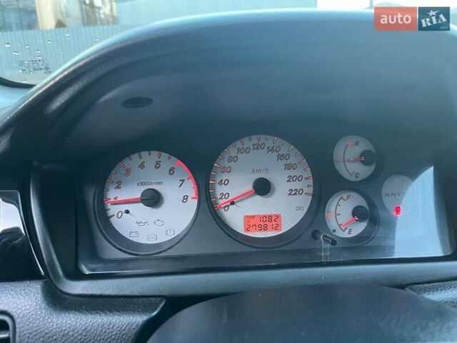Серый Мицубиси Лансер, объемом двигателя 1.6 л и пробегом 279 тыс. км за 3990 $, фото 12 на Automoto.ua