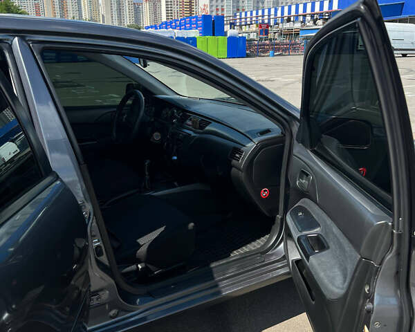 Сірий Міцубісі Lancer, об'ємом двигуна 1.6 л та пробігом 223 тис. км за 4500 $, фото 10 на Automoto.ua