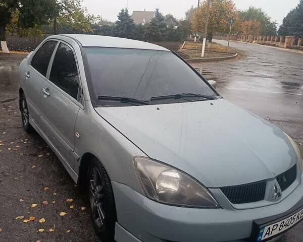 Сірий Міцубісі Lancer, об'ємом двигуна 2 л та пробігом 263 тис. км за 4300 $, фото 3 на Automoto.ua