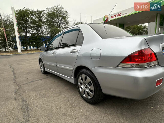 Серый Мицубиси Лансер, объемом двигателя 1.58 л и пробегом 183 тыс. км за 4800 $, фото 6 на Automoto.ua