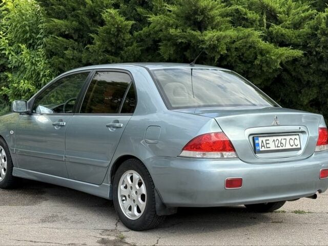 Серый Мицубиси Лансер, объемом двигателя 1.6 л и пробегом 220 тыс. км за 4400 $, фото 3 на Automoto.ua