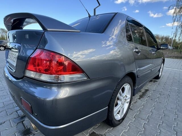 Мицубиси Лансер 2006 в Черновцах на Automoto.ua Серый Мицубиси Лансер, объемом двигателя 1.6 л и пробегом 263 тыс. км за 4500 $, фото 2 на Automoto.ua