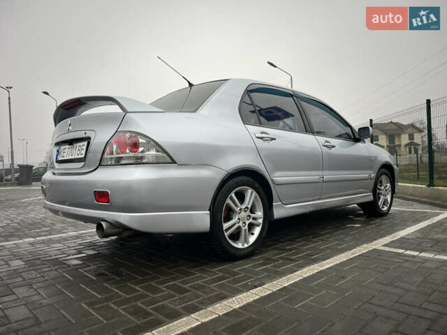 Сірий Міцубісі Lancer, об'ємом двигуна 2 л та пробігом 187 тис. км за 4500 $, фото 12 на Automoto.ua