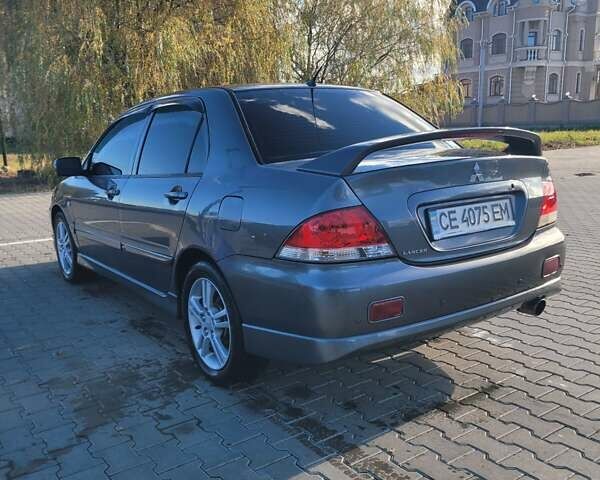 Мицубиси Лансер 2006 в Черновцах на Automoto.ua Серый Мицубиси Лансер, объемом двигателя 1.6 л и пробегом 299 тыс. км за 4300 $, фото 8 на Automoto.ua