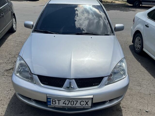 Міцубісі Lancer 2006 у Полтаві на Automoto.ua Сірий Міцубісі Lancer, об'ємом двигуна 1.6 л та пробігом 250 тис. км за 4500 $, фото 3 на Automoto.ua