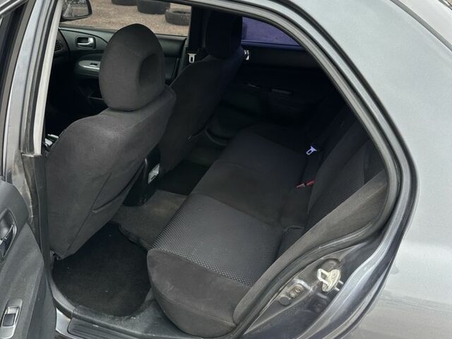 Серый Мицубиси Лансер, объемом двигателя 1.6 л и пробегом 250 тыс. км за 2550 $, фото 6 на Automoto.ua