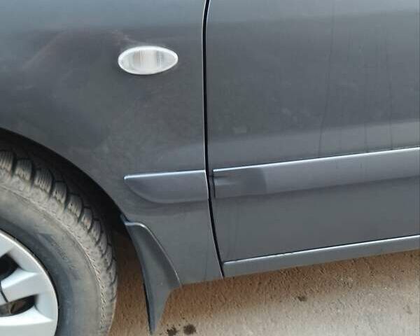 Сірий Міцубісі Lancer, об'ємом двигуна 1.58 л та пробігом 217 тис. км за 3500 $, фото 11 на Automoto.ua