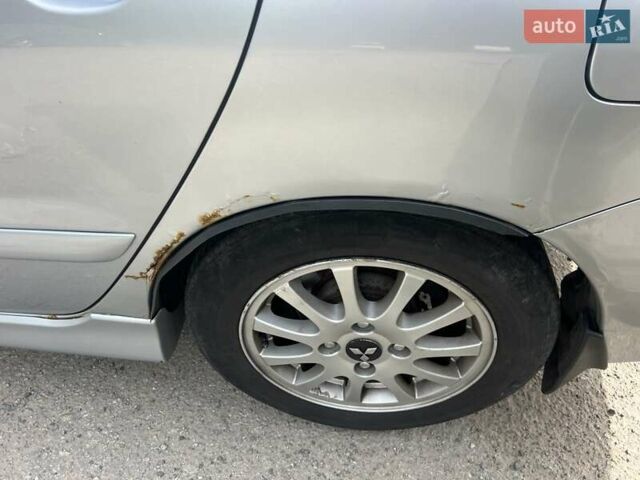 Сірий Міцубісі Lancer, об'ємом двигуна 1.58 л та пробігом 197 тис. км за 3450 $, фото 8 на Automoto.ua