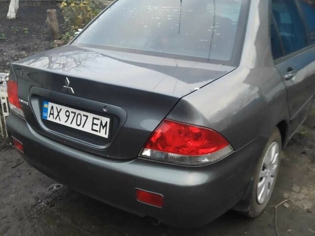 Сірий Міцубісі Lancer, об'ємом двигуна 1.6 л та пробігом 202 тис. км за 3300 $, фото 1 на Automoto.ua