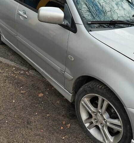 Серый Мицубиси Лансер, объемом двигателя 2 л и пробегом 284 тыс. км за 4100 $, фото 1 на Automoto.ua