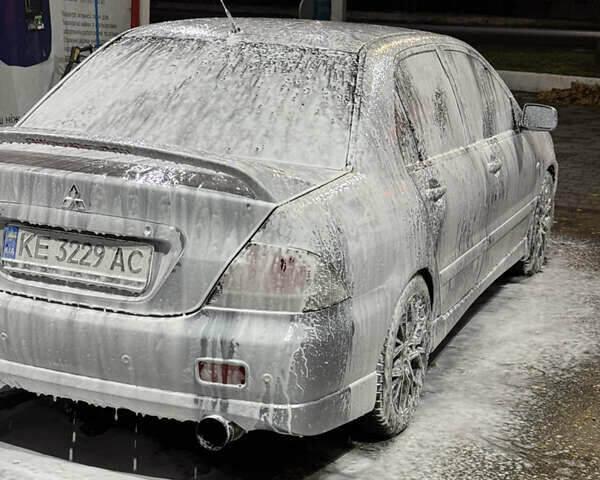 Серый Мицубиси Лансер, объемом двигателя 2 л и пробегом 256 тыс. км за 7000 $, фото 12 на Automoto.ua