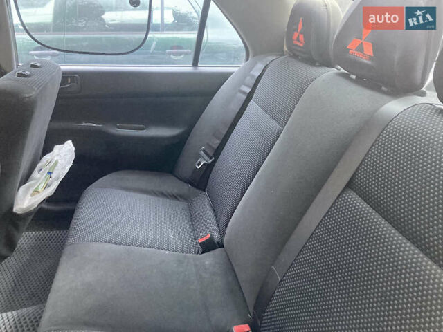Сірий Міцубісі Lancer, об'ємом двигуна 1.6 л та пробігом 222 тис. км за 4900 $, фото 11 на Automoto.ua