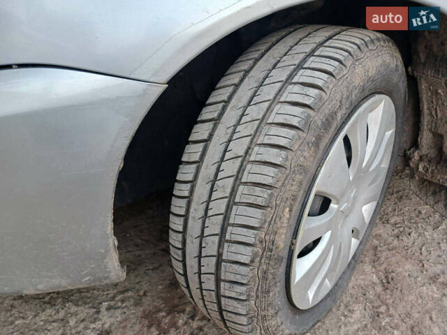 Серый Мицубиси Лансер, объемом двигателя 1.58 л и пробегом 215 тыс. км за 4000 $, фото 21 на Automoto.ua