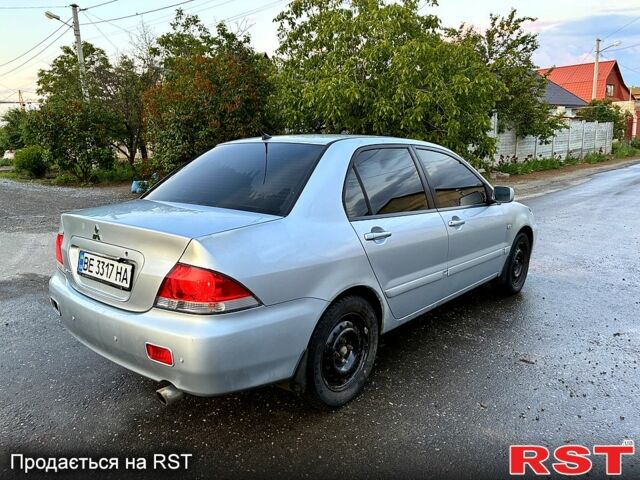 Сірий Міцубісі Lancer, об'ємом двигуна 1.6 л та пробігом 310 тис. км за 2900 $, фото 4 на Automoto.ua