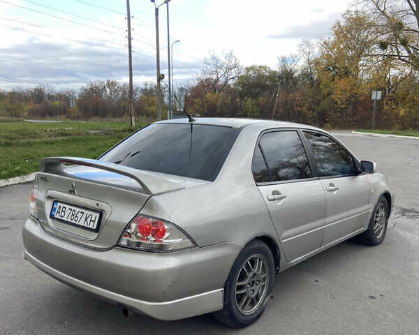Мицубиси Лансер 2006 в Погребище на Automoto.ua Серый Мицубиси Лансер, объемом двигателя 2 л и пробегом 320 тыс. км за 3300 $, фото 3 на Automoto.ua