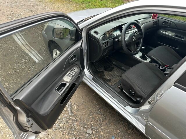 Сірий Міцубісі Lancer, об'ємом двигуна 1.6 л та пробігом 270 тис. км за 2900 $, фото 8 на Automoto.ua