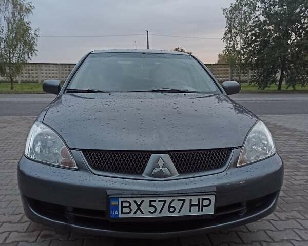 Сірий Міцубісі Lancer, об'ємом двигуна 1.58 л та пробігом 160 тис. км за 4600 $, фото 1 на Automoto.ua