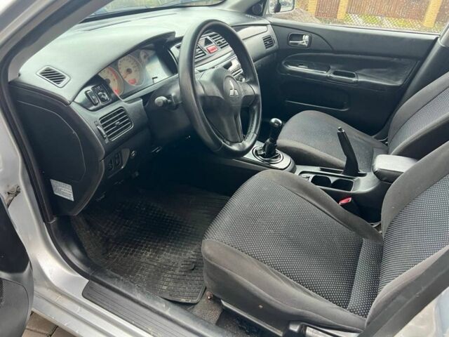 Серый Мицубиси Лансер, объемом двигателя 1.6 л и пробегом 333 тыс. км за 2800 $, фото 10 на Automoto.ua