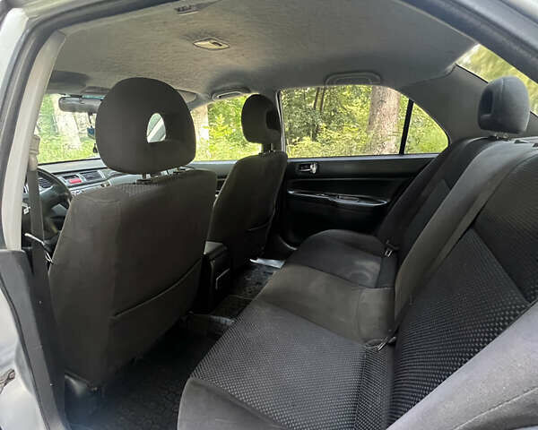 Сірий Міцубісі Lancer, об'ємом двигуна 1.6 л та пробігом 333 тис. км за 2600 $, фото 6 на Automoto.ua