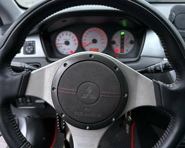 Серый Мицубиси Лансер, объемом двигателя 2 л и пробегом 256 тыс. км за 7000 $, фото 7 на Automoto.ua