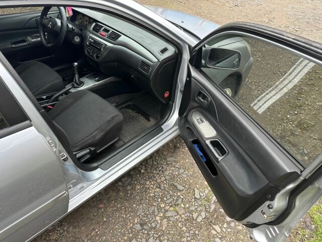Сірий Міцубісі Lancer, об'ємом двигуна 1.6 л та пробігом 270 тис. км за 2900 $, фото 14 на Automoto.ua