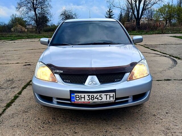 Сірий Міцубісі Lancer, об'ємом двигуна 1.6 л та пробігом 220 тис. км за 5300 $, фото 1 на Automoto.ua