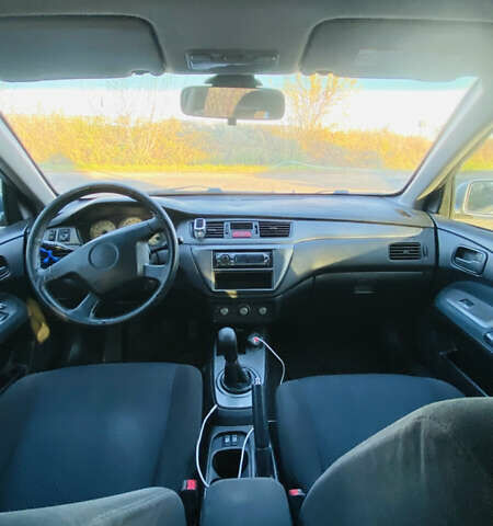 Мицубиси Лансер 2006 в Львове на Automoto.ua Серый Мицубиси Лансер, объемом двигателя 1.6 л и пробегом 253 тыс. км за 2499 $, фото 5 на Automoto.ua