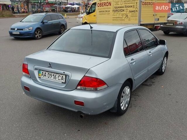 Мицубиси Лансер 2006 в Киеве на Automoto.ua Серый Мицубиси Лансер, объемом двигателя 1.6 л и пробегом 426 тыс. км за 3800 $, фото 4 на Automoto.ua