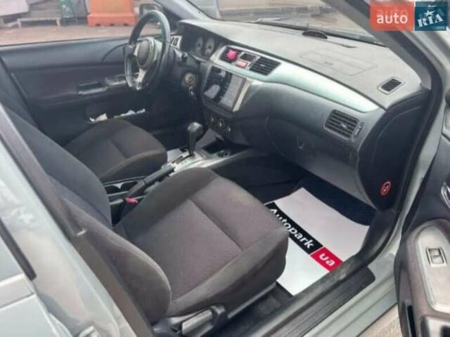 Сірий Міцубісі Lancer, об'ємом двигуна 2 л та пробігом 263 тис. км за 4300 $, фото 12 на Automoto.ua