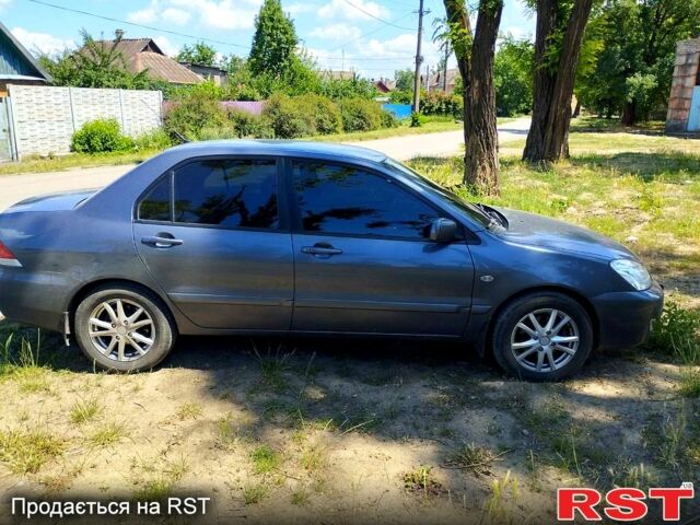 Сірий Міцубісі Lancer, об'ємом двигуна 1.6 л та пробігом 168 тис. км за 5300 $, фото 7 на Automoto.ua