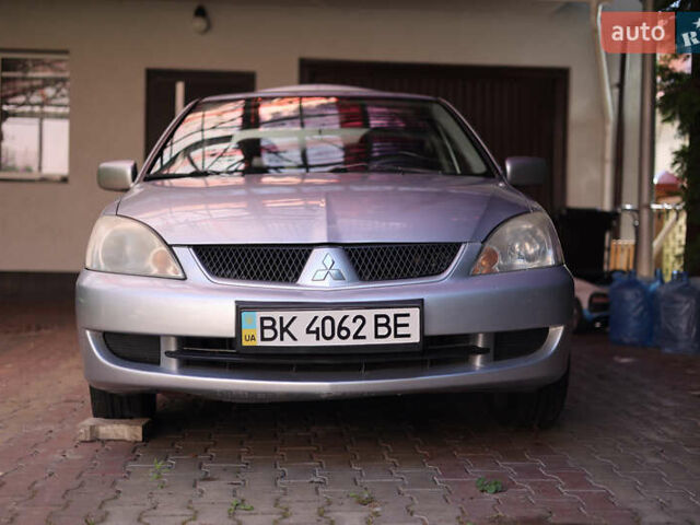 Сірий Міцубісі Lancer, об'ємом двигуна 1.58 л та пробігом 200 тис. км за 2200 $, фото 7 на Automoto.ua