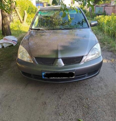 Сірий Міцубісі Lancer, об'ємом двигуна 0 л та пробігом 3 тис. км за 1800 $, фото 1 на Automoto.ua