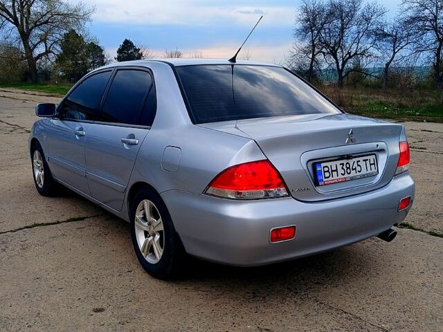 Сірий Міцубісі Lancer, об'ємом двигуна 1.6 л та пробігом 220 тис. км за 5300 $, фото 2 на Automoto.ua