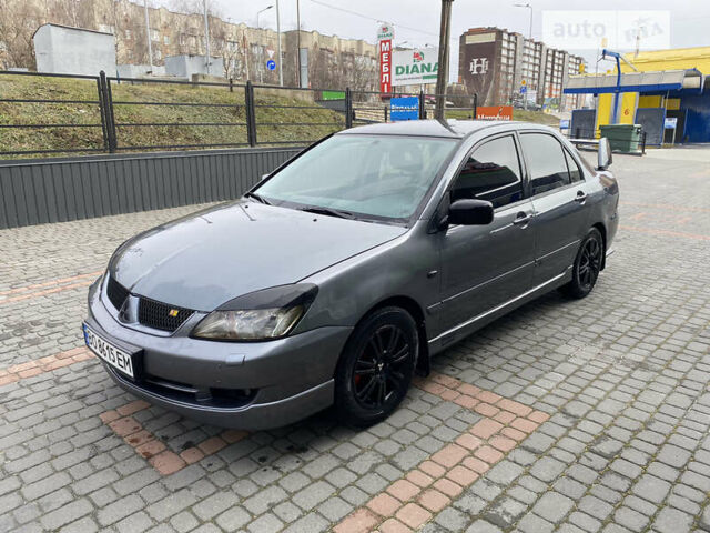 Сірий Міцубісі Lancer, об'ємом двигуна 1.58 л та пробігом 228 тис. км за 4300 $, фото 3 на Automoto.ua