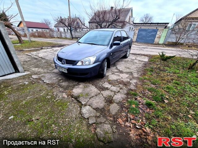 Сірий Міцубісі Lancer, об'ємом двигуна 1.6 л та пробігом 223 тис. км за 5450 $, фото 5 на Automoto.ua