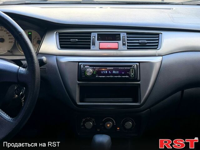 Сірий Міцубісі Lancer, об'ємом двигуна 1.6 л та пробігом 270 тис. км за 4700 $, фото 6 на Automoto.ua