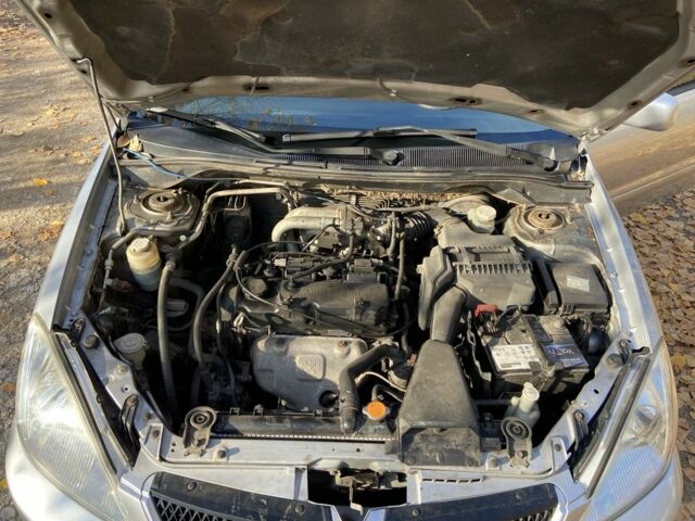 Серый Мицубиси Лансер, объемом двигателя 1.6 л и пробегом 204 тыс. км за 3999 $, фото 15 на Automoto.ua