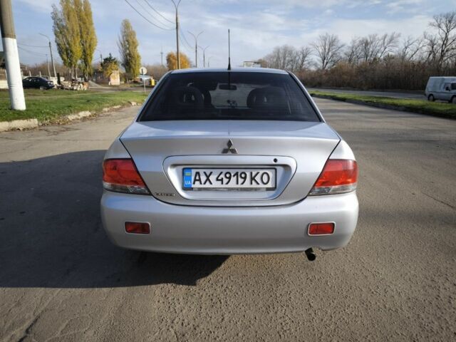 Сірий Міцубісі Lancer, об'ємом двигуна 1.6 л та пробігом 340 тис. км за 3000 $, фото 4 на Automoto.ua