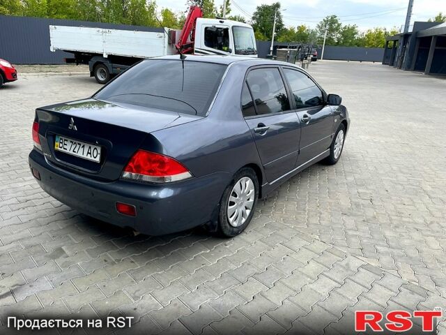 Сірий Міцубісі Lancer, об'ємом двигуна 1.6 л та пробігом 162 тис. км за 4650 $, фото 3 на Automoto.ua