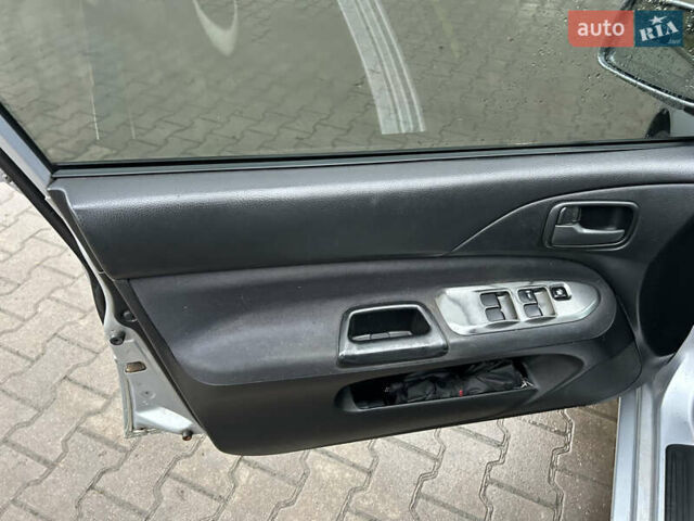 Сірий Міцубісі Lancer, об'ємом двигуна 1.6 л та пробігом 223 тис. км за 3900 $, фото 12 на Automoto.ua
